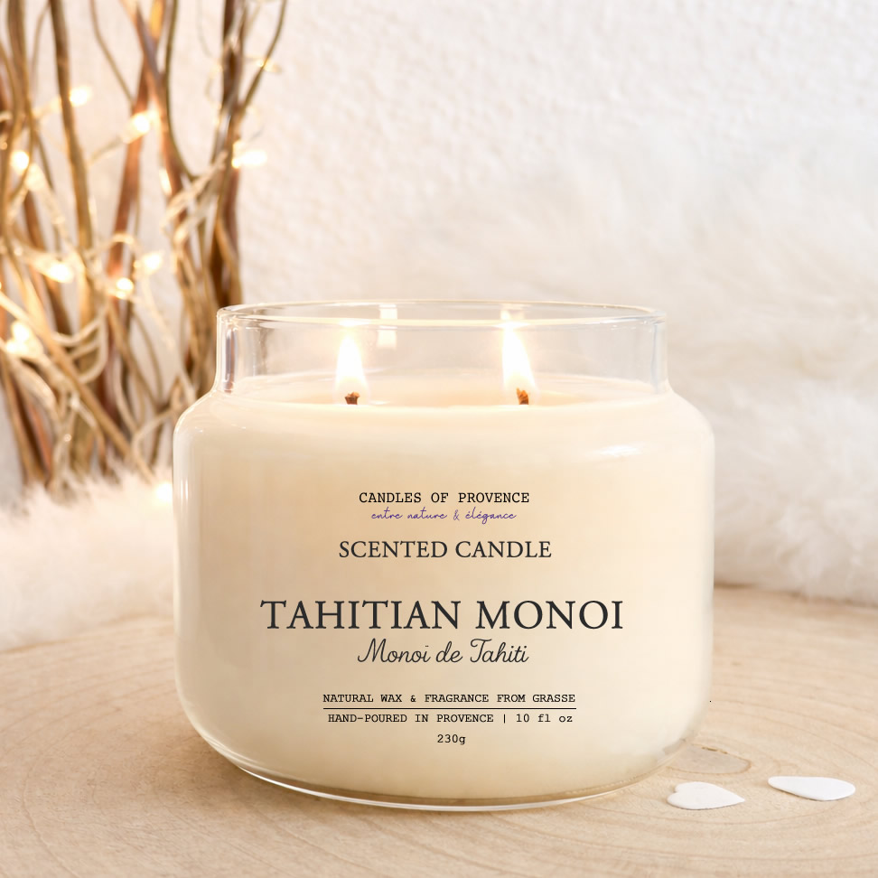 Hand-poured Tahitian Monoi scented candle in glass jar made with natural soy wax.