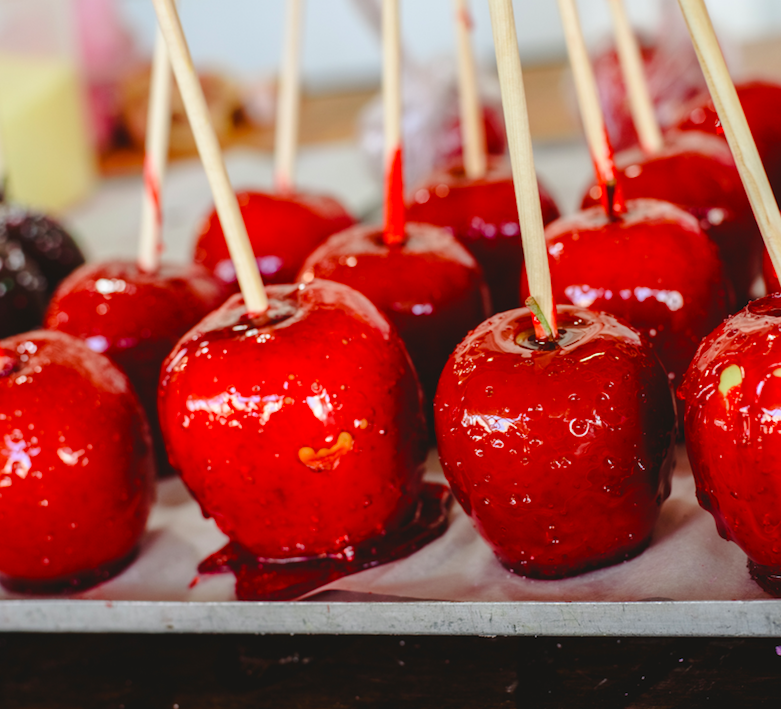 Traditional red candy apples inspiring the Large Candy Apple scented candle